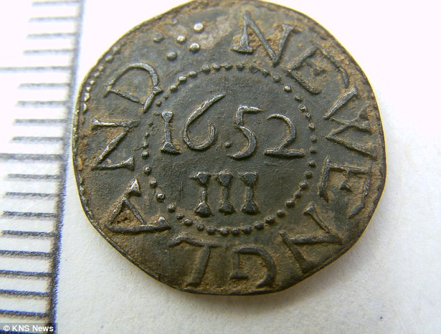 Historic find: The silver coin, bearing the date 1652, was unearthed by the metal detector enthusiast on Sunday